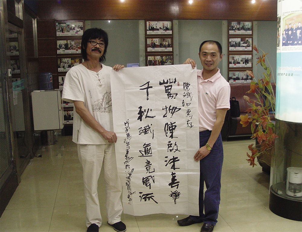 Mr Zhangyulong,famous Chinese Calligrapher,President of Chinese Yijing Feng Shui Painting Research Institute,Chinese Daoshu top Calligrapher Guinness world record holder ,live performed Calligraphy fo